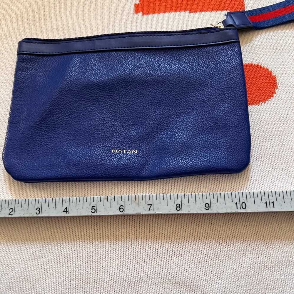 Natan leather wristlet with navy/red strap
